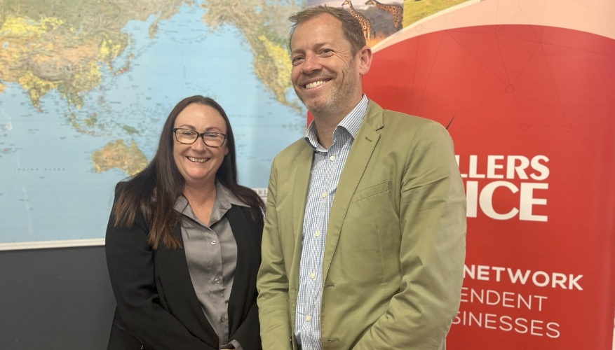 Au Revoir Travel and Cruise owner Sam Gallaher with Travellers Choice Business development Manager Tim Bolton